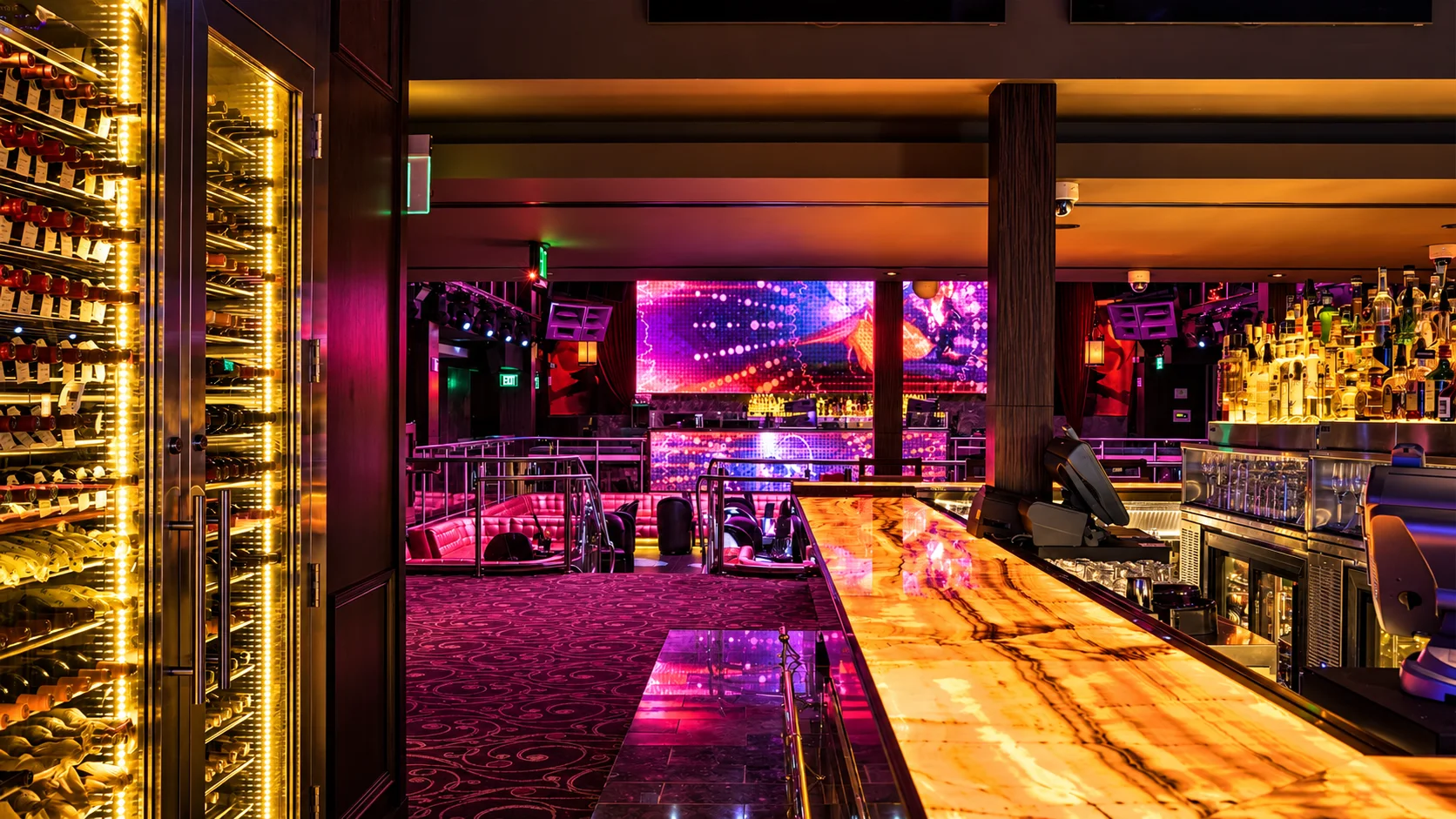E11Even — Nightclub bar with illuminated bottle display