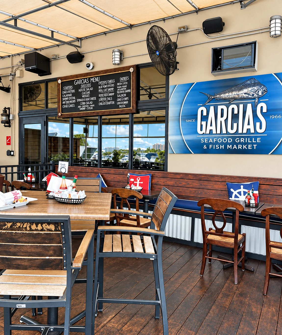 Garcia's Seafood Grill - Terrace seating and Garcia’s sign